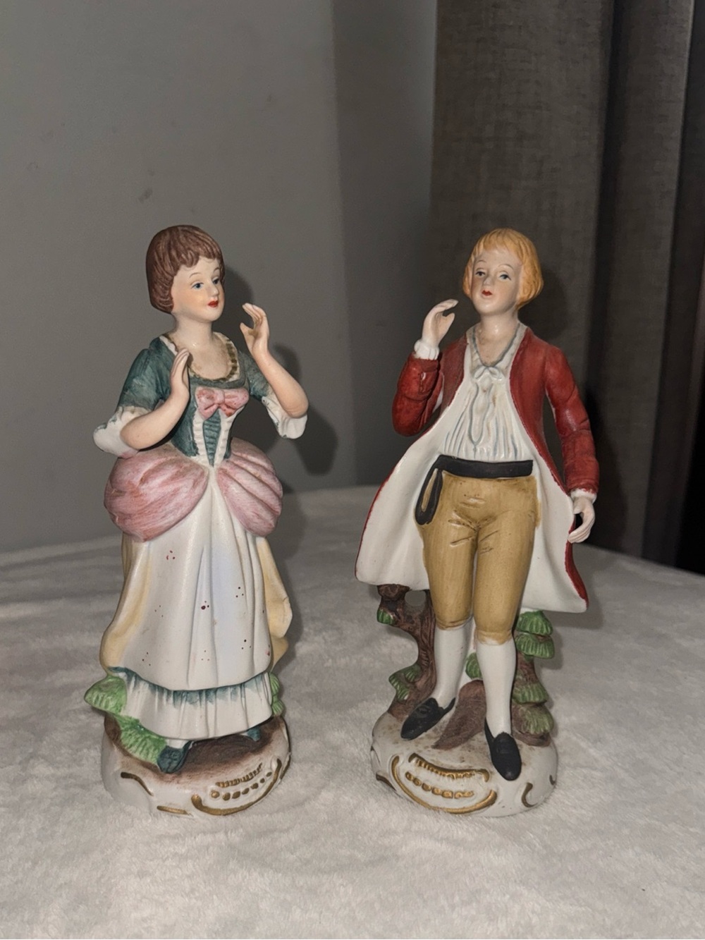 porcelain colonial-style figurines